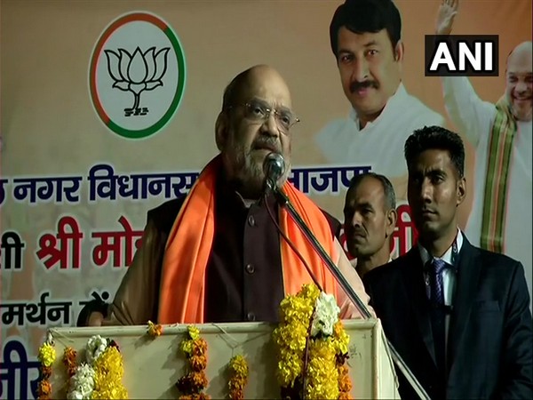 Home Minister Amit Shah speaking at a public meeting in Karawal Nagar, Delhi on Friday.