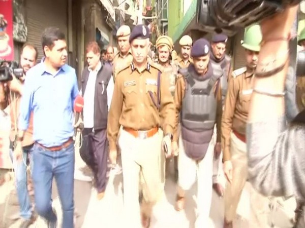 Delhi Police Special Commissioner SN Shrivastava during flag march in North East Delhi's Khajuri Khas area on Thursday. Photo/ANI
