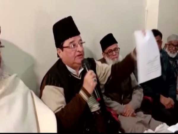 ST Hassan with a copy of CAA in Moradabad, Uttar Pradesh on Tuesday. Photo/ANI