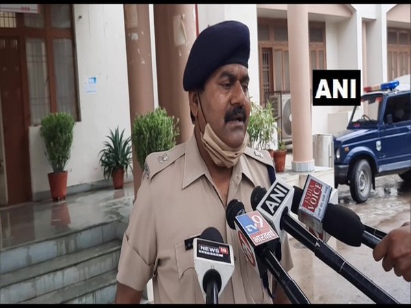 Superintendent of Police (Crime) Arvind Kumar speaking to reporters in Aligarh on Wednesday. 