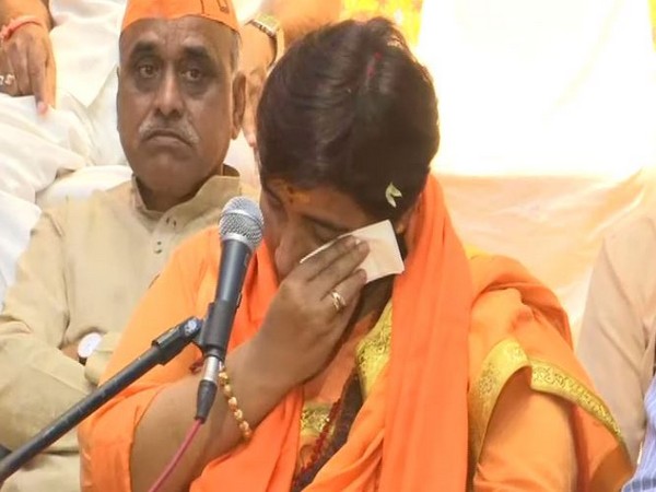 BJP leader Sadhvi Pragya Singh Thakur breaks down while recalling her 'torture' during custody. She was addressing BJP workers in Bhopal, Madhya Pradesh, on Thursday. Photo/ANI