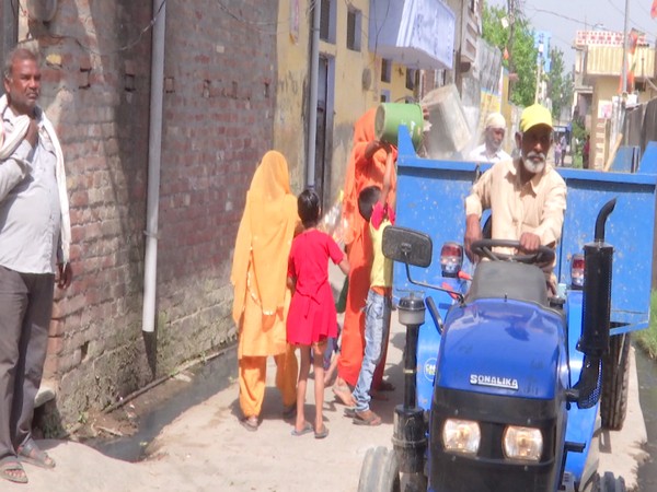 Sanitation workers dump garbage outside AAP MLA's Trilokpuri residence