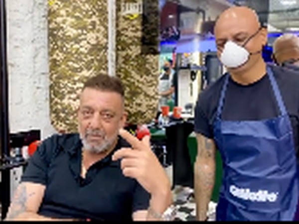 Actor Sanjay Dutt with hair stylist Aalim Hakim in Mumbai (Image Source: Instagram)