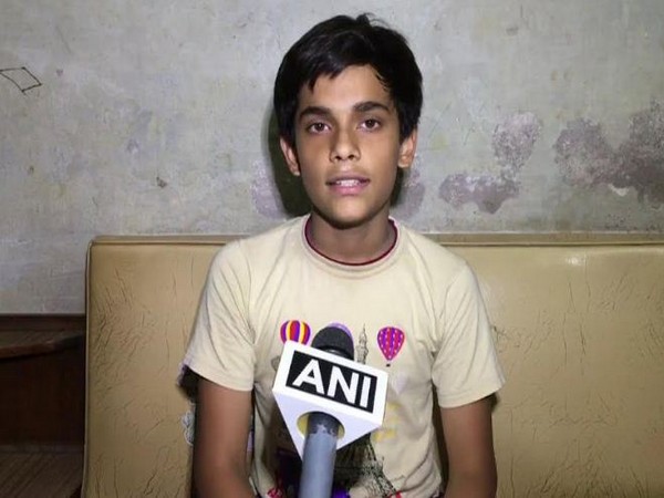 Sarthak Tripathi, son of former employee of UPSE, talking to ANI in Kanpur on Friday. Photo/ANI