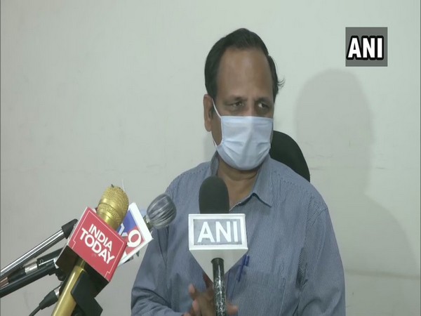 Satyendar Jain speaking to reporters in New Delhi on Saturday.