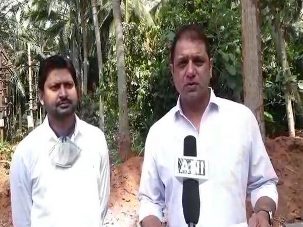 Eluru MP Kotagiri Sridhar (R) speaking to ANI on Friday about the newly launched scheme of zero-interest loans for women SHGs in Andhra Pradesh. Photo/ANI