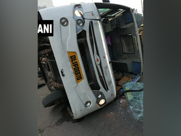 School bus turned turtle after collision with cluster bus in Naraina on Thursday Photo/ANI