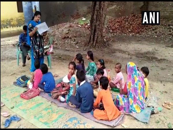 Students of a govt primary school in Shahjahanpur study under open sky due to lack of adequate building infrastructure