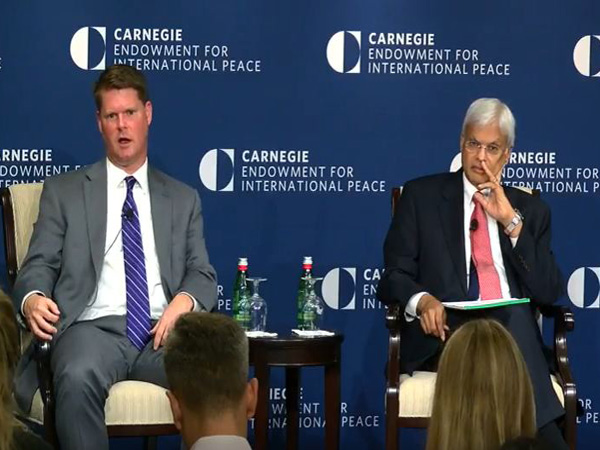 Former US assistant secretary of defense Randall G. Schriver (On the left)