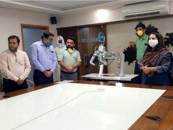 Gujarat Chief Minister launches India's first PPE Kit seam sealing machine through video conference. 