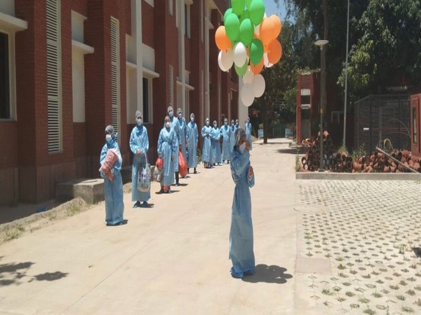 Three recovered COVID-19 patients were given a farewell at PGIMER, Chandigarh, on Wednesday. Photo/ANI