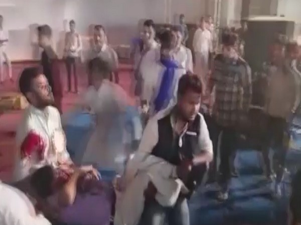 People carrying injured person to a hospital in Agra (Photo/ANI)