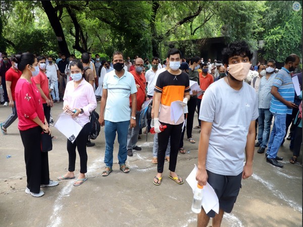Students wait outside an exam centre as they arrive to appear for NEET exam 2021. (FIle photo)