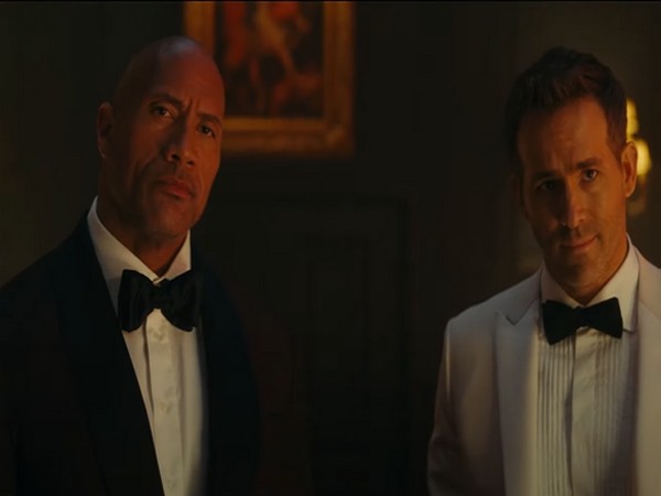 A still from the teaser of 'Red Notice' (Image Source: YouTube)