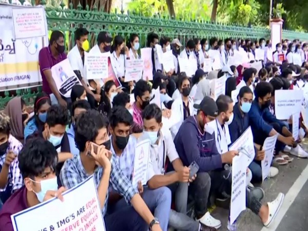 Students pursuing medicine in China stage protest in Kerala. (Photo/ANI)