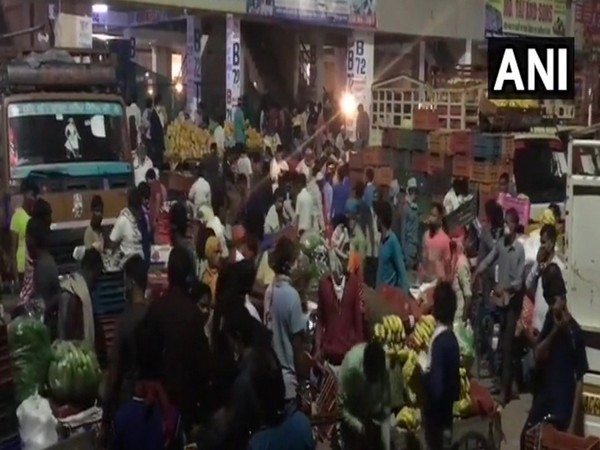 Social distancing norm being flouted at Noida's Sector-88 market. Photo/ANI