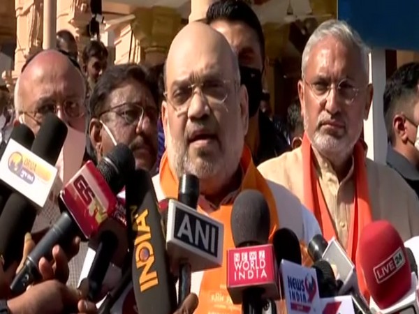 Union Home Minister Amit Shah along with his family members casts his vote at Naranpura Sub Zonal Office in Ahmedabad on Sunday.