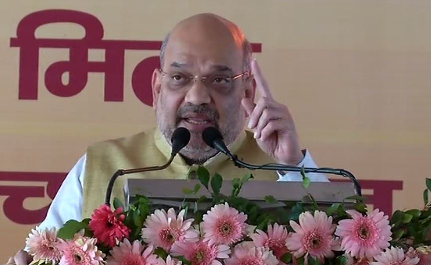 BJP president Amit Shah while addressing a rally in Jharkhand's Godda on Tuesday. Photo/ANI
