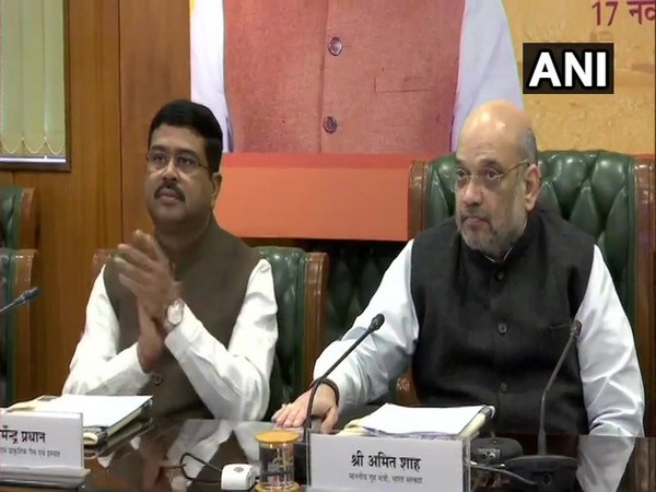 Union Home Minister Amit Shah (right) and Union Minister of Petroleum and Natural Gas Dharmendra Pradhan