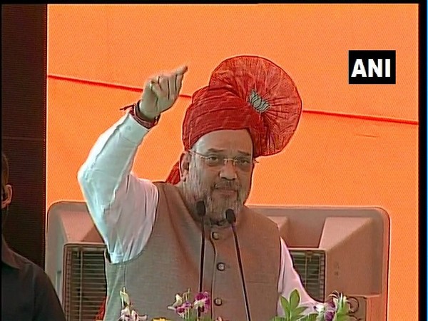 Amit Shah speaking at a rally in Haryana's Faridabad on Wednesday. Photo/ANI