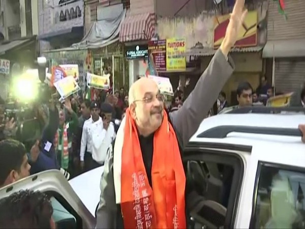 Home Minister Amit Shah visited Amar Colony to meet Afghan Sikh refugees on Sunday as part of awareness campaign conducted by BJP on CAA. Photo/ANI