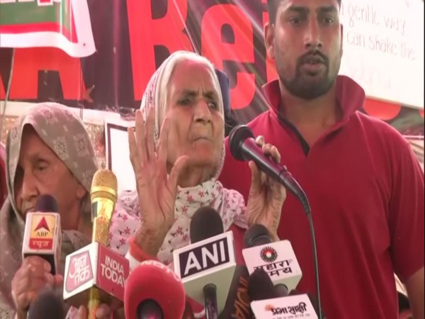 One of the senior citizens participating in the protest speaking to reporters on Monday. Photo/ANI