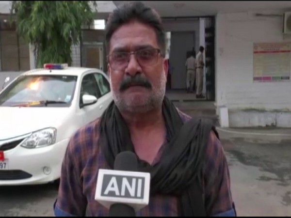 Kanpur encounter main accused Vikas Dubey's brother-in-law, Rajeev Nigam speaking to ANI in MP's Shahdol on Tuesday. (Photo/ANI)