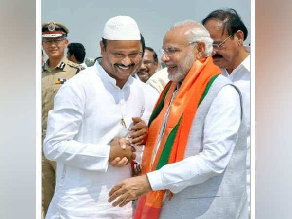 BJP Minority Morcha state president Shaik Baji with PM Modi (Photo: Twitter/@BajiBJP)