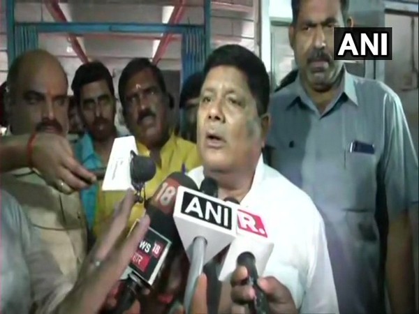 Bihar Minister Suresh Sharma speaking to reporters in Muzaffarpur, Bihar on Sunday.