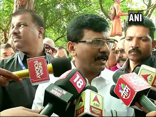 Shiv Sena leader Sanjay Raut speaking to reporters in Mumbai on Sunday.