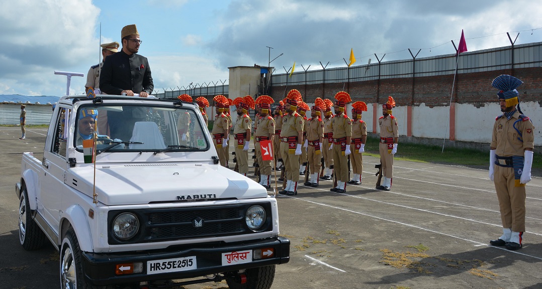 Deputy Commissioner Mohammad Yaseen Choudhary takes salute of the march past. Photo/ANI