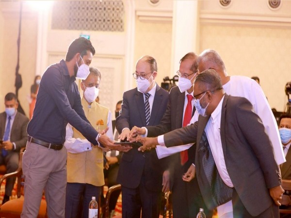 Foreign Secretary Harsh Vardhan Shringla with Sri Lankan Foreign Minister Prof GL Peiris inaugurating four projects in the housing and education sectors. (Twitter)