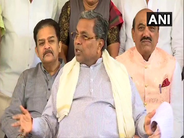 Congress leader Siddaramaiah speaking to reporters on Friday