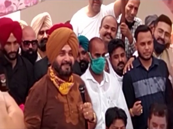 Punjab Congress President Navjot Singh Sidhu addressing party workers in Jalandhar. (Photo/ ANI)