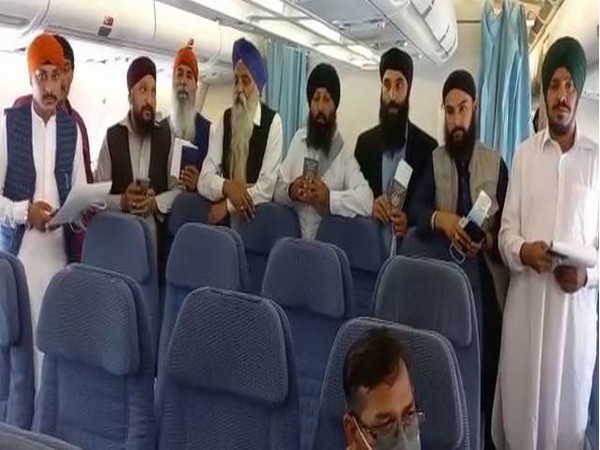 Afghan Sikhs on a flight from Kabul to New Delhi. (ANI)