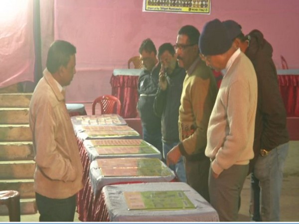 People witness the exhibition of rare coins, currencies in Siliguri, West Bengal on Sunday