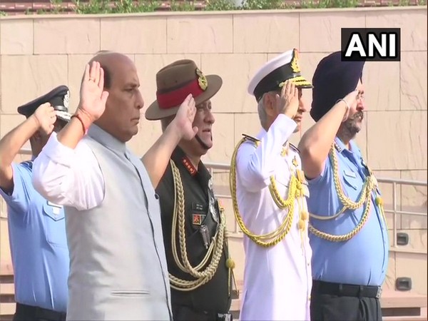 Defence Minister Rajnath Singh along with chiefs of Army, Navy and Air Force at National War Memorial on Saturday.