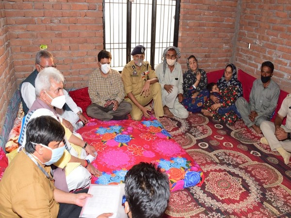 J-K LG Manoj Sinha visited Rajouri district's Tarkassi village and reached out to the families of three youth who were killed in Shopian in July.