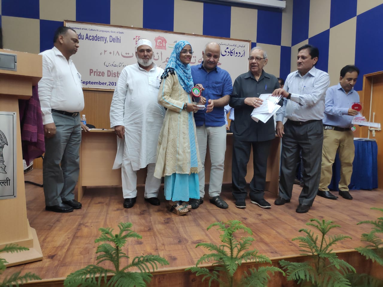 Delhi Deputy Chief Minister with Urdu language toppers of various Delhi universities on Monday.