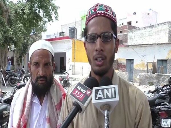 Mujiburrehman speaking to reporters in Aligarh, Uttar Pradesh on Friday.
