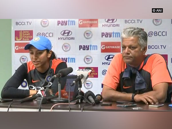Indian Women's team stand in skipper Smriti Mandhana and coach WV Raman (ANI Picture)