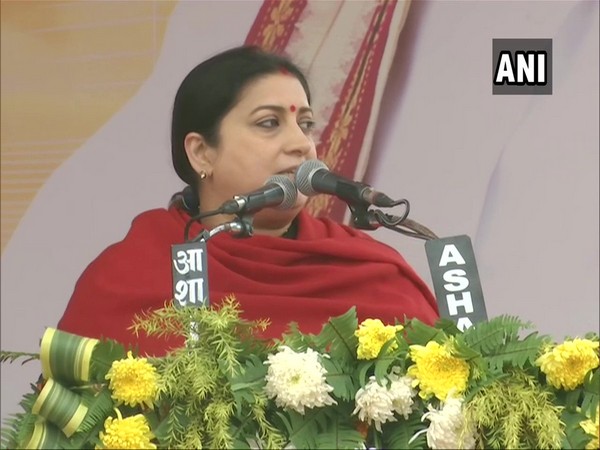 Union Minister Smriti Irani speaking at a public function in Varanasi on Saturday. Photo/ANI