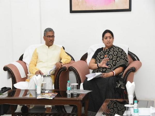 Women and Child Development Minister Smriti Zubin Irani and Chief Minister Trivendra Singh Rawat on Tuesday at Chief Minister's residence. Photo/ANI