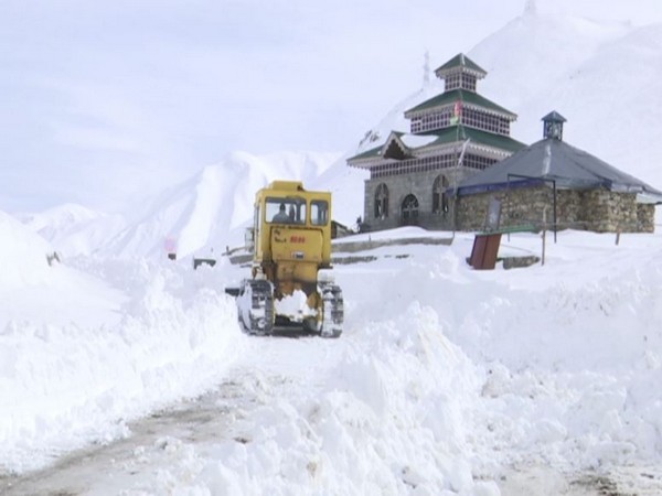 Snow clearing operation at the Mughal Road on Tuesday.