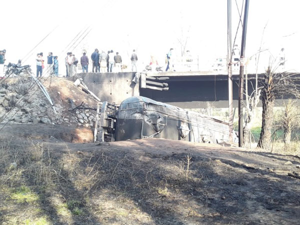 Locals near the Nalagarh area of Solan district in Himachal Pradesh after a fire tragedy broke out in the area. [Photo/ANI]