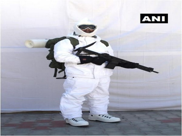 A soldier wearing American extreme cold weather clothing and carrying a Sig Sauer assault rifle. Photo/ANI