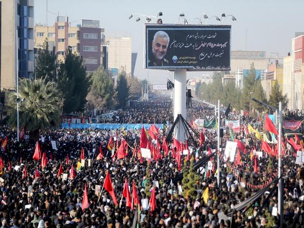 Iranian people attend a funeral procession and burial for Iranian General Qasem Soleimani at his hometown Kerman in Iran.