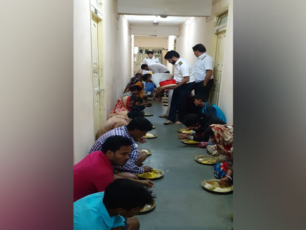 Villagers being served food at the Sagar Pilot Station of the Kolkata Port Trust on Sunday. Photo/ANI
