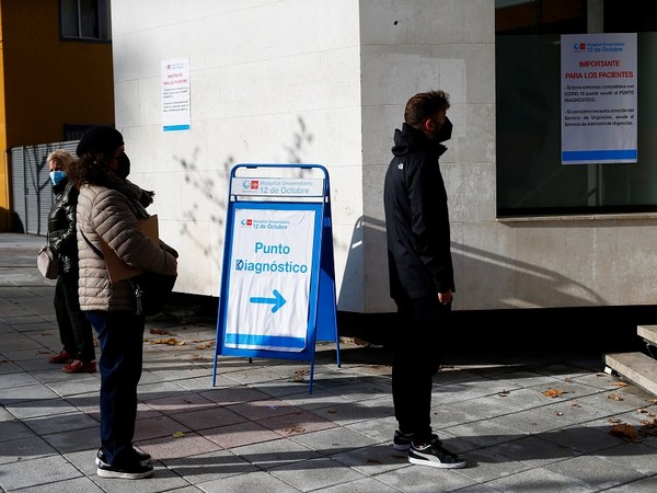People queue to get tested for the COVID-19 after the Christmas holiday break. (Photo Credit - Reuters)