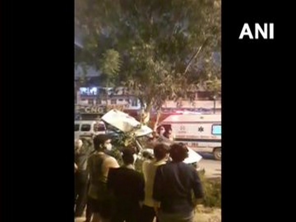 Delhi: A speeding car fell off Vikaspuri Flyover after its driver lost control and hit another car (Photo/ANI)
